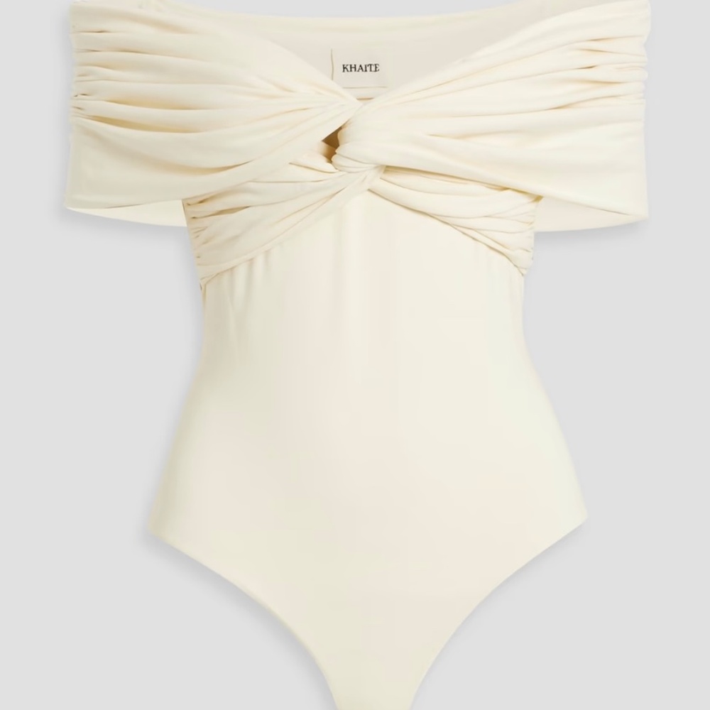 Khaite Cream Cerise Off Shoulder Twisted Cotton Blend Jersey Bodysuit, $780